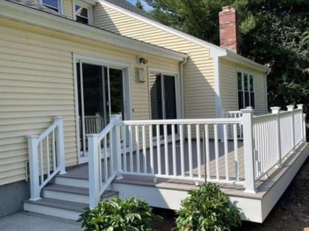 Buis new deck Bellingham MA with landscaping around the structure.