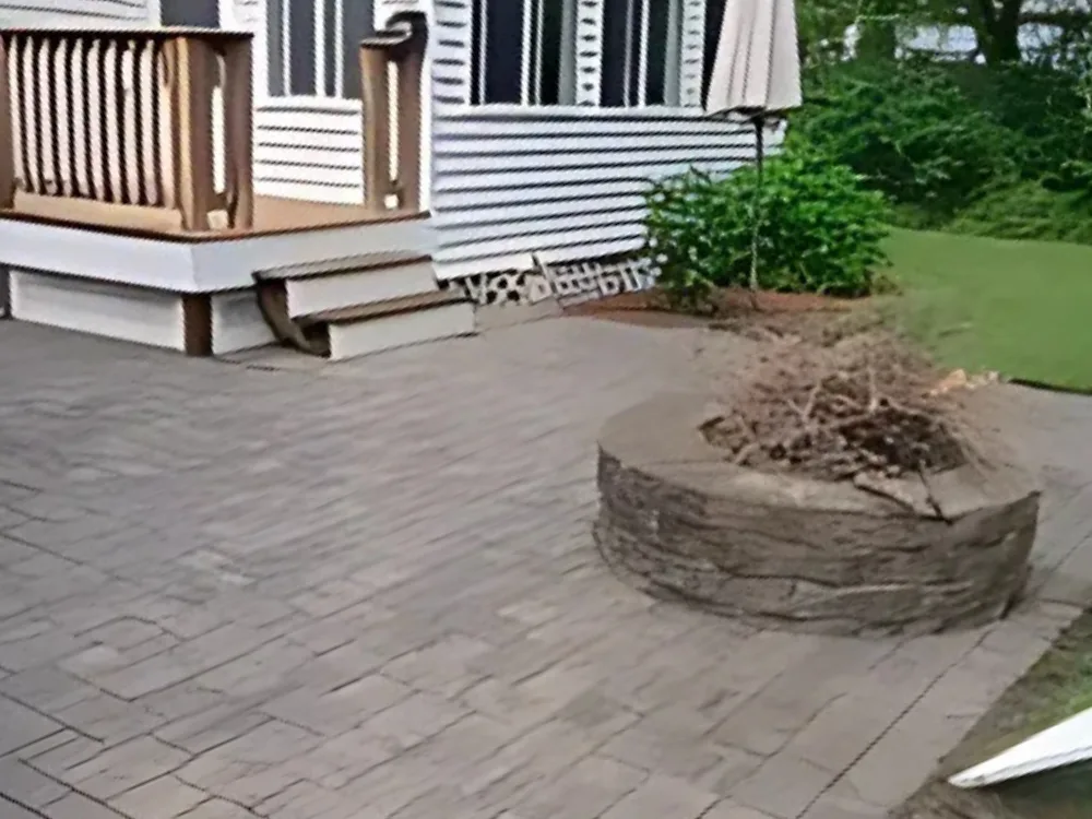 Patio cleaning project showing a restored paved outdoor area.