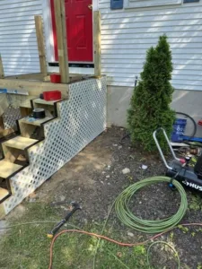 New stairs Milford MA side lattice base during construction