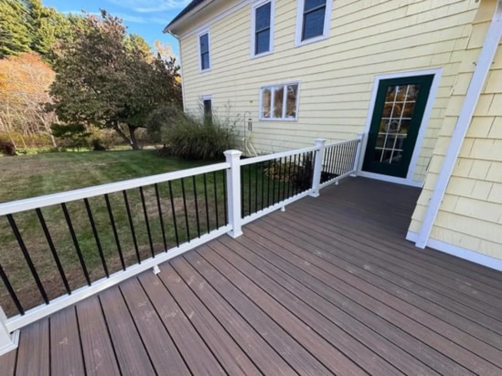 Deck Renovation in Medway featuring new composite flooring and railings.