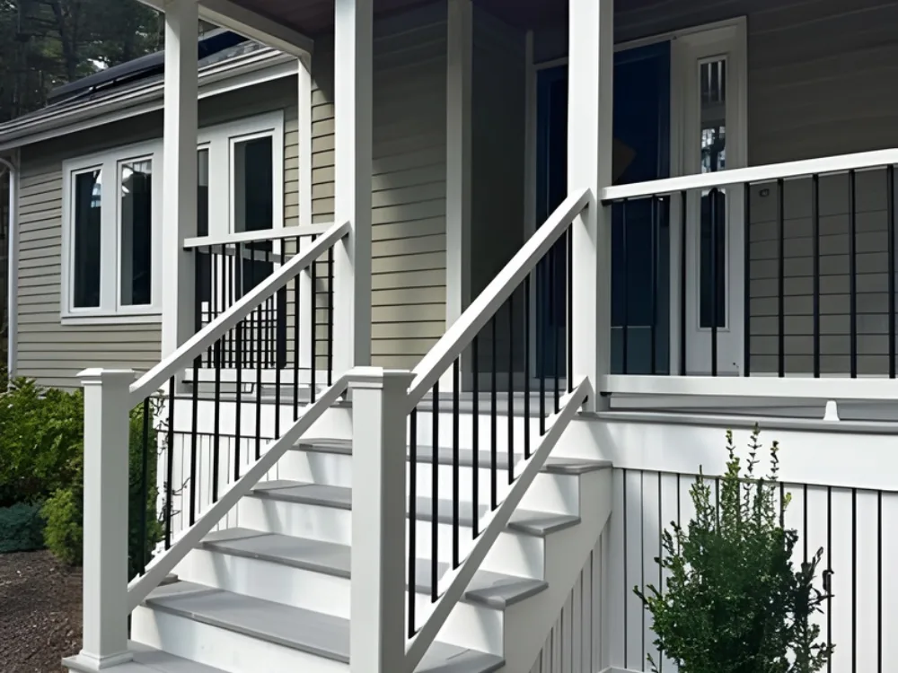 Porch Remodeling Holliston with updated stairs and railing system.