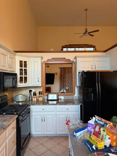 Completed white kitchen transformation after professional cabinet refinishing MA.