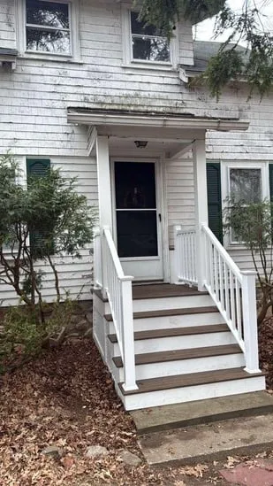 Professional finish of the Deck Remodeling Southborough MA project with focus on the composite stair treads.