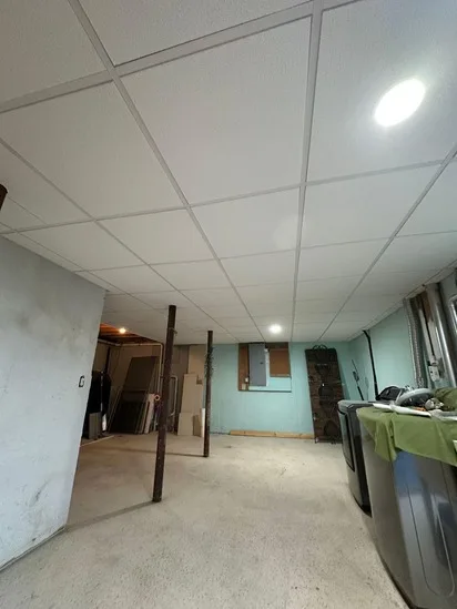 Completed drop ceiling Spencer MA demonstrating flush recessed lighting integration.